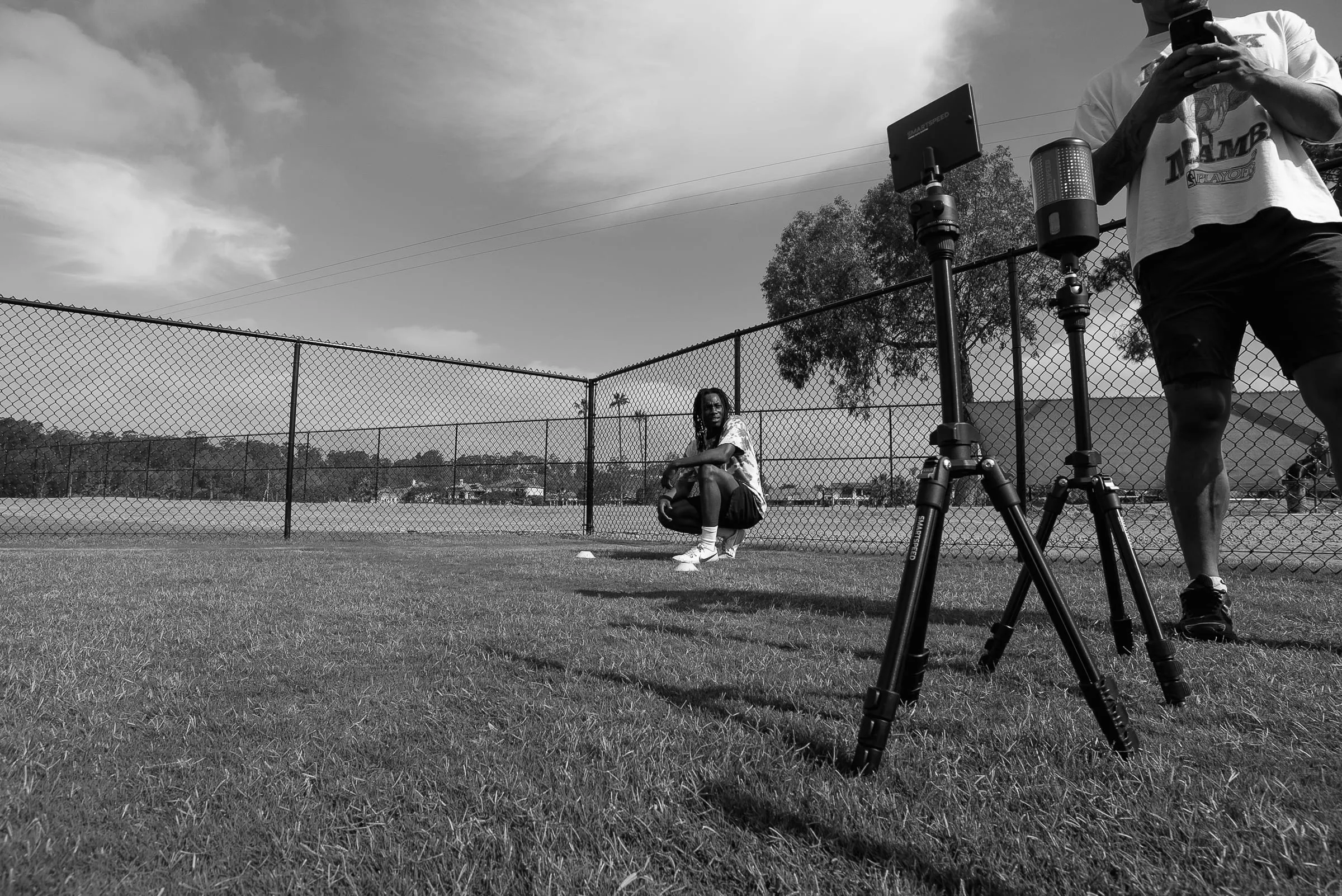 Timing gates set up for a sprint test on the training field